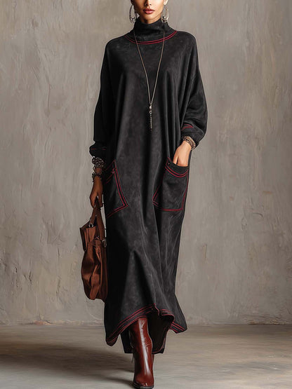 Estela | Vestito lungo in suede sintetico nero con cuciture a contrasto rosse e tasche a toppa