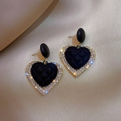 Orecchini a cuore in oro nero
