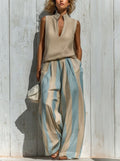 Sofía | Completo Elegante in Tessuto Fluido: Top e Pantaloni Palazzo a Righe