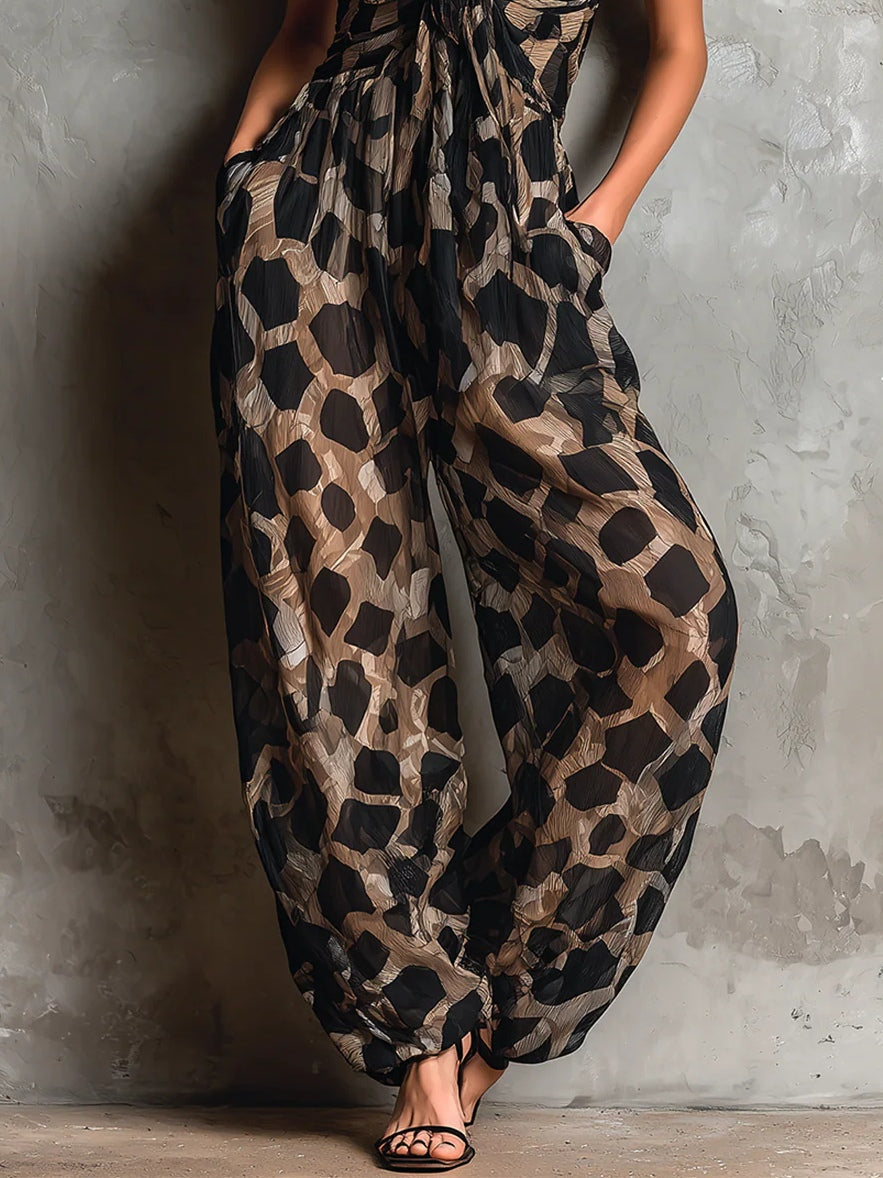 Mono in chiffon morbido con collo halter e stampa animale nera