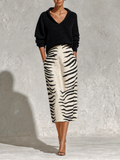 Set di Due Pezzi: Top Tricot Nero e Gonna Midi in Lino a Stampa Zebra